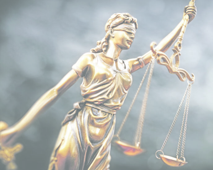 Legal law concept statue of Lady Justice with scales of justice