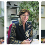 Auf dem Foto sieht man drei Personen, eine Frau und zwei Männer an ihren Schreibtischen