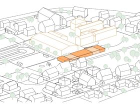 Der ebenbürtige Neubau (Orange) soll im Anschluss an das bestehende Schulgebäude errichtet werden.